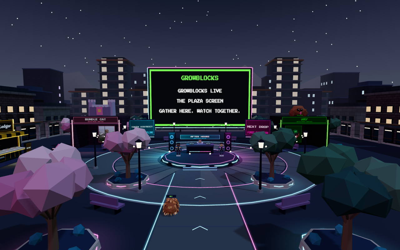 Neon stage and gathering space in GrowBlocks Plaza